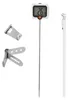 A digital thermometer with accessories, laid out on a white background. Produktbild-Vorschau