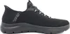 A side view of a black Skechers slip-on sneaker. Voir les images du produit