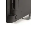 A close-up view of the bottom right corner of a black electronic device, likely a TV, showing a set of buttons and a curved edge. Produktbild-Vorschau