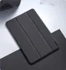 A black tablet case with a tri-fold cover is displayed on a contrasting background. Produktbild-Vorschau
