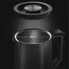 A close-up view of the top opening of a black electric kettle, with a lid hovering above it. A measurement of 13cm is indicated across the opening. Podgląd zdjęcia produktu