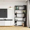 A modern living room with a black corner bookshelf filled with books and decorative items, next to a white cabinet and a large screen. Voir les images du produit
