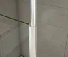 A close-up view of a shower enclosure pole with a glass panel attached. Produktbild-Vorschau