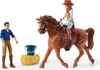 A toy horse with a rider and a standing figure next to a hay bale and bucket. Produktbild-Vorschau