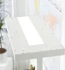 A close-up shot of a white LED floor lamp with a bright light strip. Produktbild-Vorschau