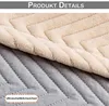 Close-up view of two fabric textures with a chevron pattern, one beige and one gray. Náhled obrázku produktu