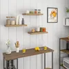 A kitchen scene with shelves and a counter displaying various items. Produktbild-Vorschau