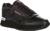 A studio shot of a black Reebok shoe with pink accents. Voir les images du produit