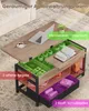 A coffee table with multiple storage compartments, some of which are highlighted with colored overlays and text. Voir les images du produit