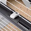 A close-up shot of a plastic latch mechanism on a wire cage. Podgląd zdjęcia produktu
