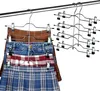 A multi-tiered metal hanger holding several skirts and a pair of jeans, displayed against a white background. Another identical hanger is visible in the background. Produktbild-Vorschau