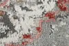 A close-up view of a textured rug with a distressed pattern. Produktbild-Vorschau