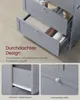 Close-up shots of a gray cabinet with drawers, highlighting design features and materials. Produktbild-Vorschau