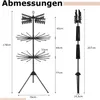 A diagram showing the dimensions of a black, three-tiered drying rack with clips and radiating arms. Anteprima dell’immagine prodotto