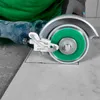 A close-up shot of a person using a cutting tool on a tile. Produktbild-Vorschau