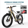 An electric mountain bike with highlighted hydraulic brake system components. Podgląd zdjęcia produktu