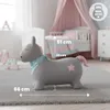A grey inflatable pony toy is shown in a child's bedroom with a bed and dresser in the background. Anteprima dell’immagine prodotto