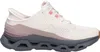 A side view of a beige Skechers women's sneaker. Produktbild-Vorschau