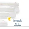 A stack of white duvets with a sun icon and text indicating it's a summer duvet. Produktbild-Vorschau