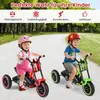 Two children riding electric tricycles on a paved path outdoors. Náhled obrázku produktu