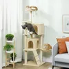 Three cats are playing on a multi-level cat tree in a living room setting. Náhled obrázku produktu