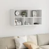 A white wall-mounted shelf unit filled with decorative items, positioned above a sofa. Voir les images du produit