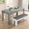 A dining table and bench set in a modern dining room setting. Anteprima dell’immagine prodotto