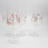 A set of four clear wine glasses with decorative patterns. Náhľad obrázku produktu