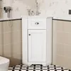 A white corner bathroom vanity with a sink and faucet, set against a tiled wall. Náhled obrázku produktu