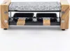 A raclette grill with a granite stone top and wooden accents. Náhľad obrázku produktu