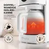 Close-up of a white coffee maker with a glass carafe filled with a red liquid, showing heat waves. Text overlays highlight product features. Náhľad obrázku produktu