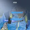 A person wearing a backpack and a blue jacket, with a walkie-talkie attached to the chest strap. There are speech bubbles with asterisks, indicating communication or data. Náhľad obrázku produktu