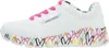 A side view of a white sneaker with colorful heart designs on the sole and pink laces. Podgląd zdjęcia produktu