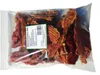 A clear plastic bag filled with dried chicken jerky pieces for dogs. Produktbild-Vorschau