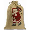 A burlap sack with a printed image of Santa Claus. Produktbild-Vorschau
