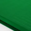 A close-up of a green pleated blind. Produktbild-Vorschau