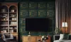 A living room scene featuring a TV mounted on a patterned wall, a bookshelf, and furniture. Produktbild-Vorschau
