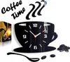 A black acrylic wall clock shaped like a coffee cup with steam rising from it, along with decorative coffee beans and a spoon. The clock has white hour markers and hands. A product box is visible on the left. Voir les images du produit