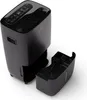 A black dehumidifier with its water tank detached, shown from a slightly elevated angle against a white background. Náhľad obrázku produktu