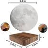 A levitating moon lamp with a wooden base, showing dimensions and a close-up of the base. Náhled obrázku produktu