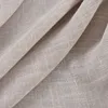 A close-up of draped fabric with a linen texture. Produktbild-Vorschau