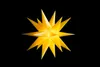 A yellow star-shaped decoration against a black background. Produktbild-Vorschau