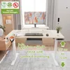 A modern standing desk setup in a home office environment. Produktbild-Vorschau
