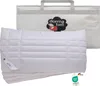 A white pillow is shown in front of a white carrying bag with the Dorma bell logo. Produktbild-Vorschau