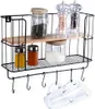 A kitchen shelf with spice jars and grinders. Anteprima dell’immagine prodotto