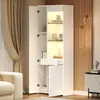 A modern white display cabinet with LED lighting is shown open, revealing shelves with decorative items. Produktbild-Vorschau