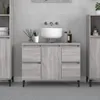 A bathroom vanity with a sink and storage cabinets. Náhled obrázku produktu