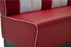 A close-up of a red and white diner-style booth seat. Produktbild-Vorschau
