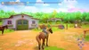 A person riding a horse in front of a stable. Produktbild-Vorschau