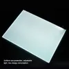A light box for drawing or tracing, shown at an angle against a black background. Produktbild-Vorschau